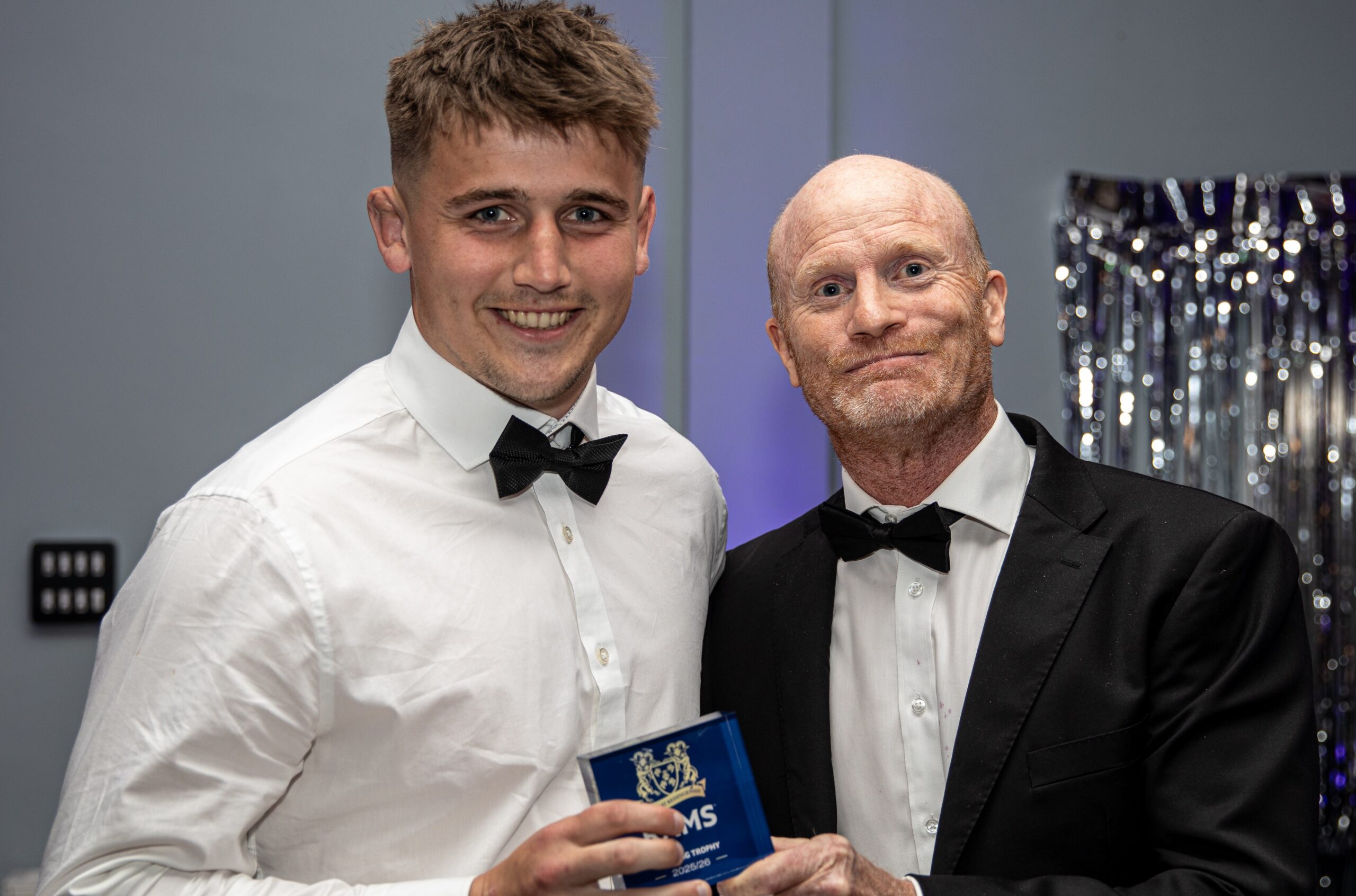 TERRIFIC TULL TAKES TACKLING TROPHY